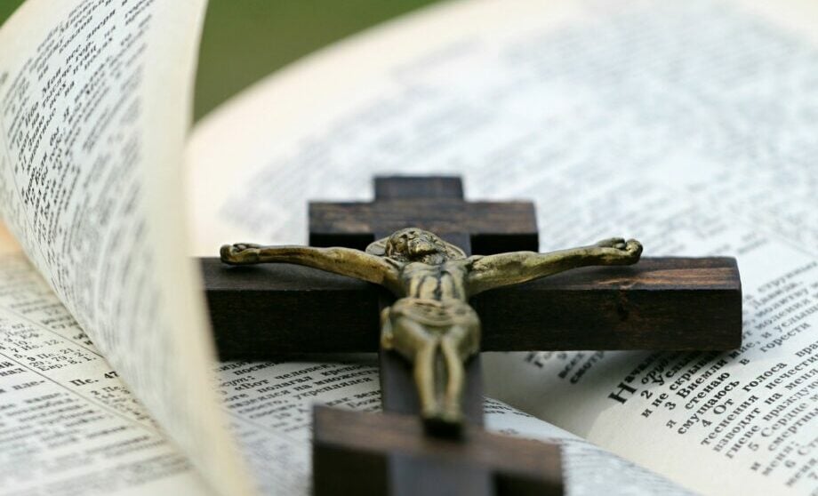 Crucifix on Top of Bible